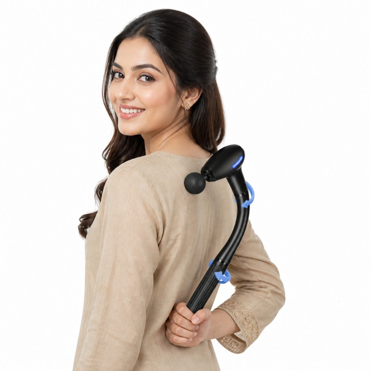 Woman using long-handle body massager on upper back