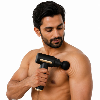 Man using massage gun on shoulder muscle with visible muscle ripple
