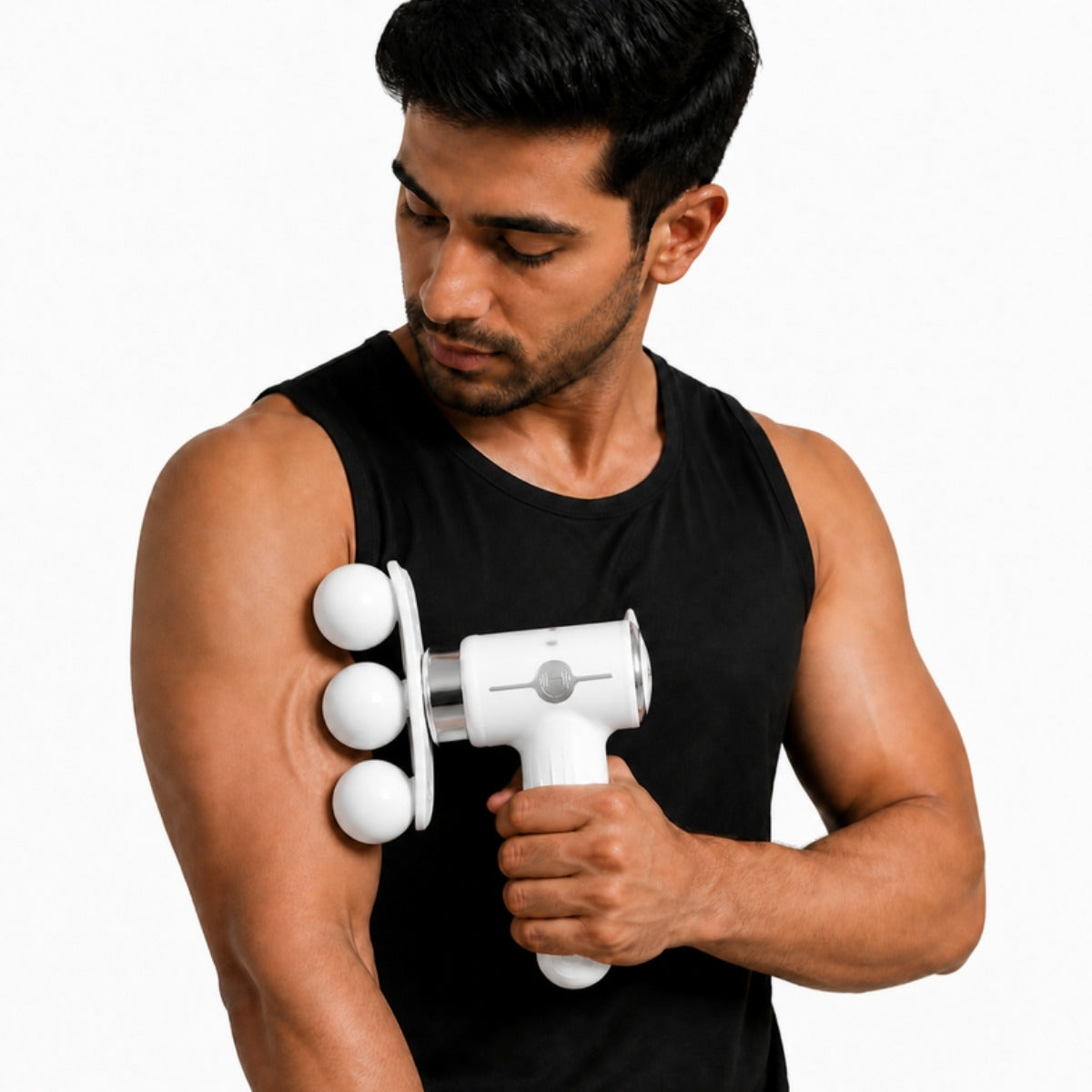 Man using mini fascia massage gun with triple ball head on upper arm